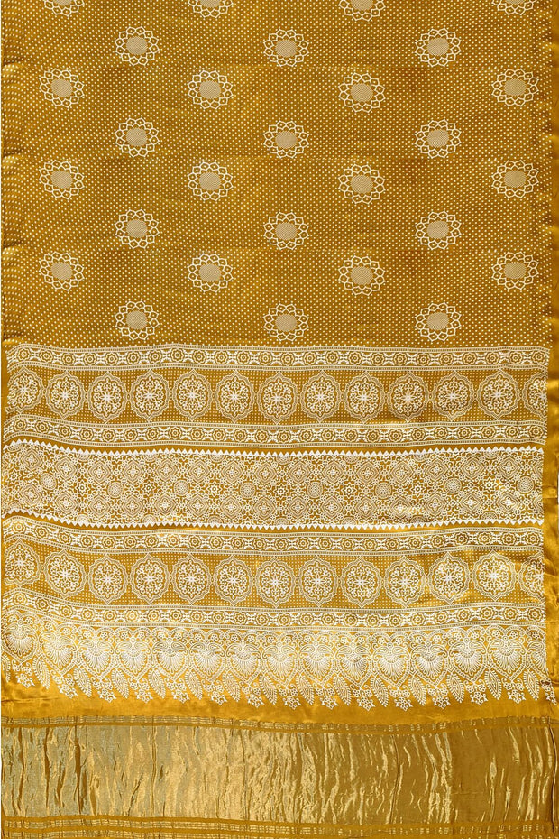 Modal silk saree in floral pattern in mustard with lagda patti (zari)  pallu