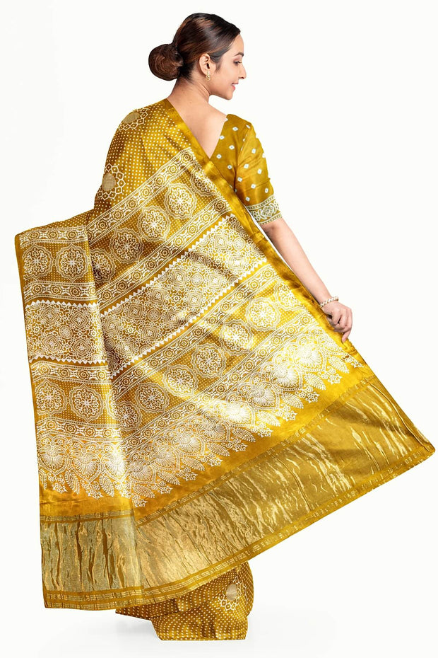 Modal silk saree in floral pattern in mustard with lagda patti (zari)  pallu