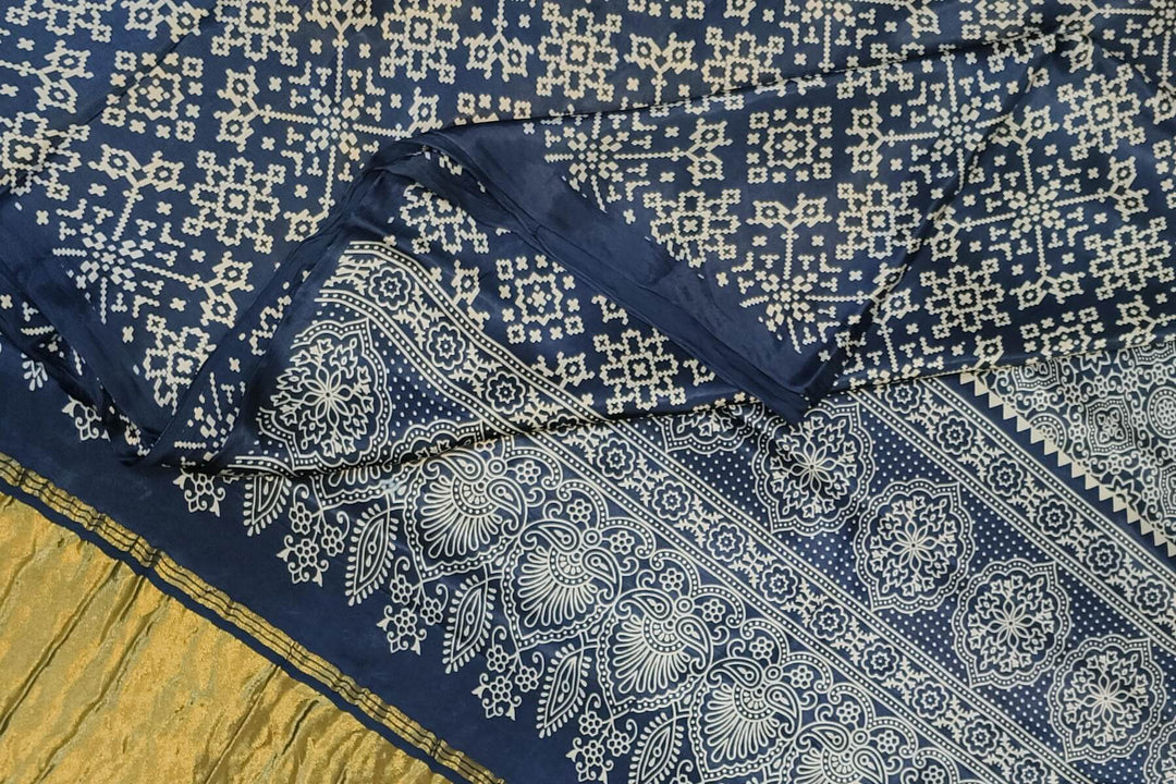 Modal silk saree in rangoli  pattern in cobalt blue with lagda patti (zari)  pallu