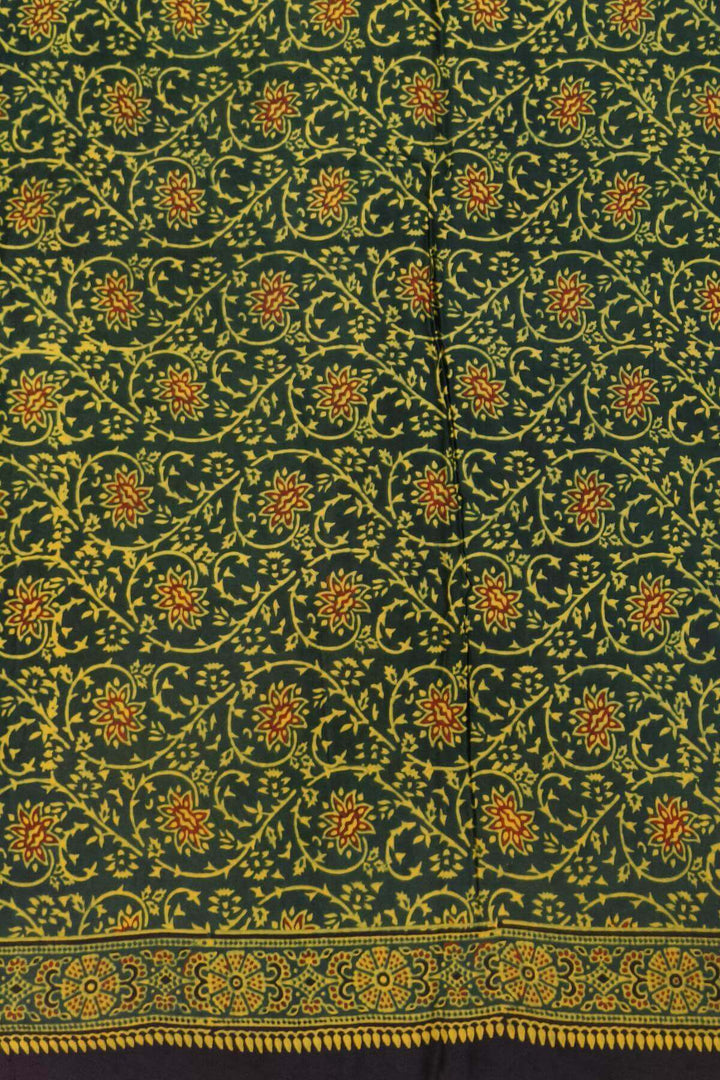 Modal silk saree in mehndi green in half & half pattern