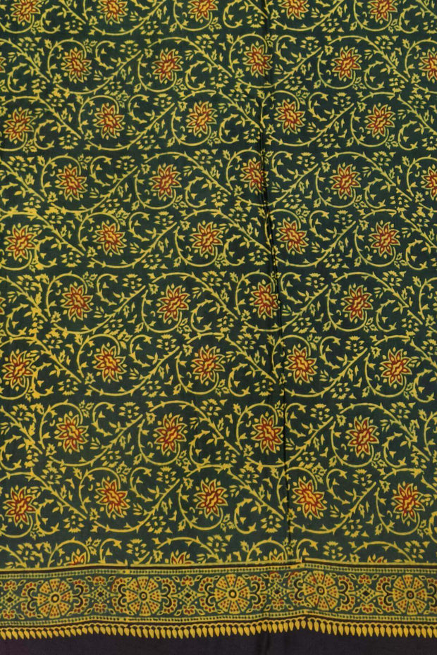 Modal silk saree in mehndi green in half & half pattern
