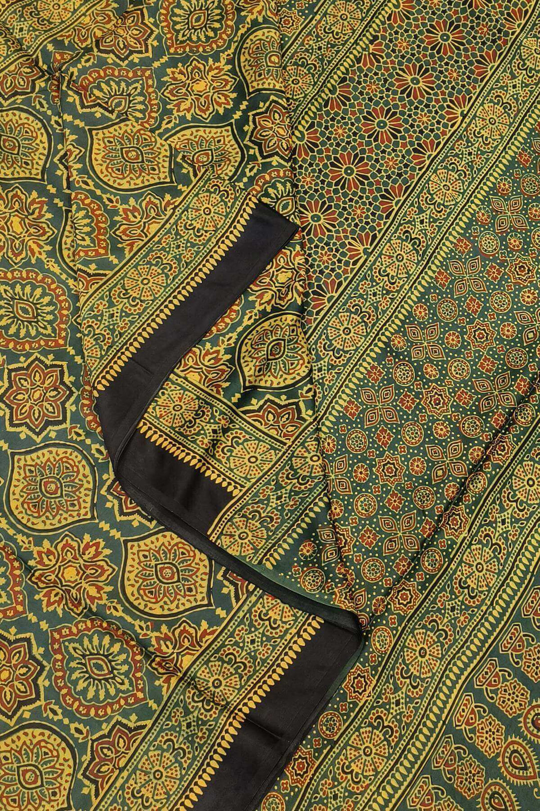 Modal silk saree in mehndi green in half & half pattern