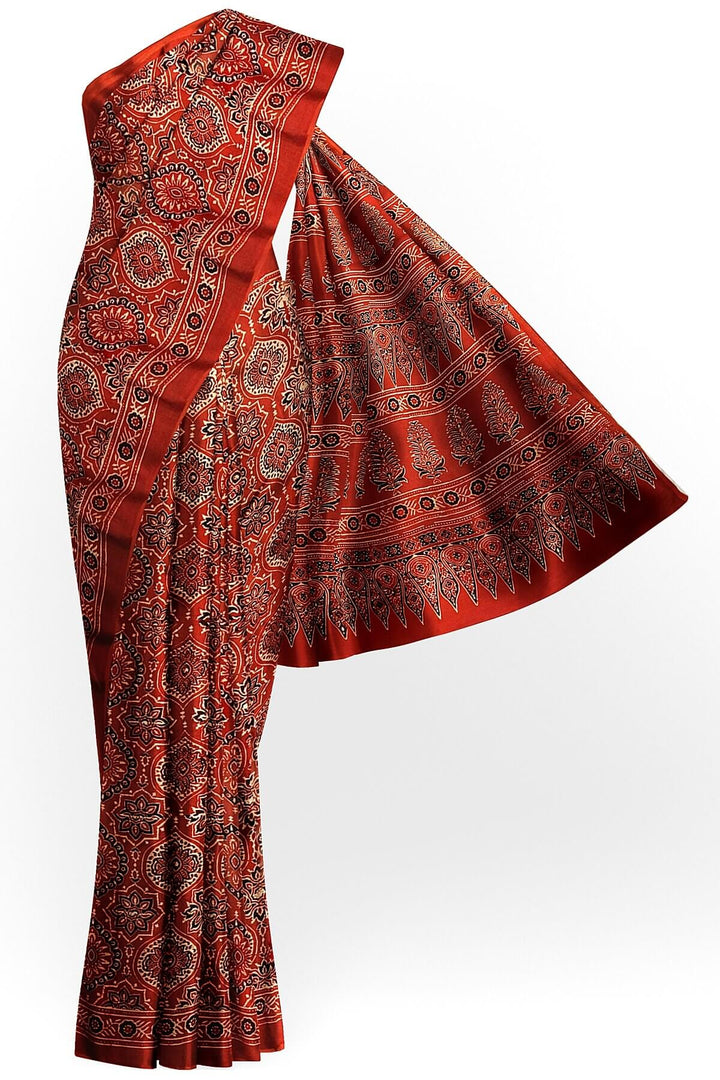 Modal silk saree in red in hand block ajrakh print in floral pattern