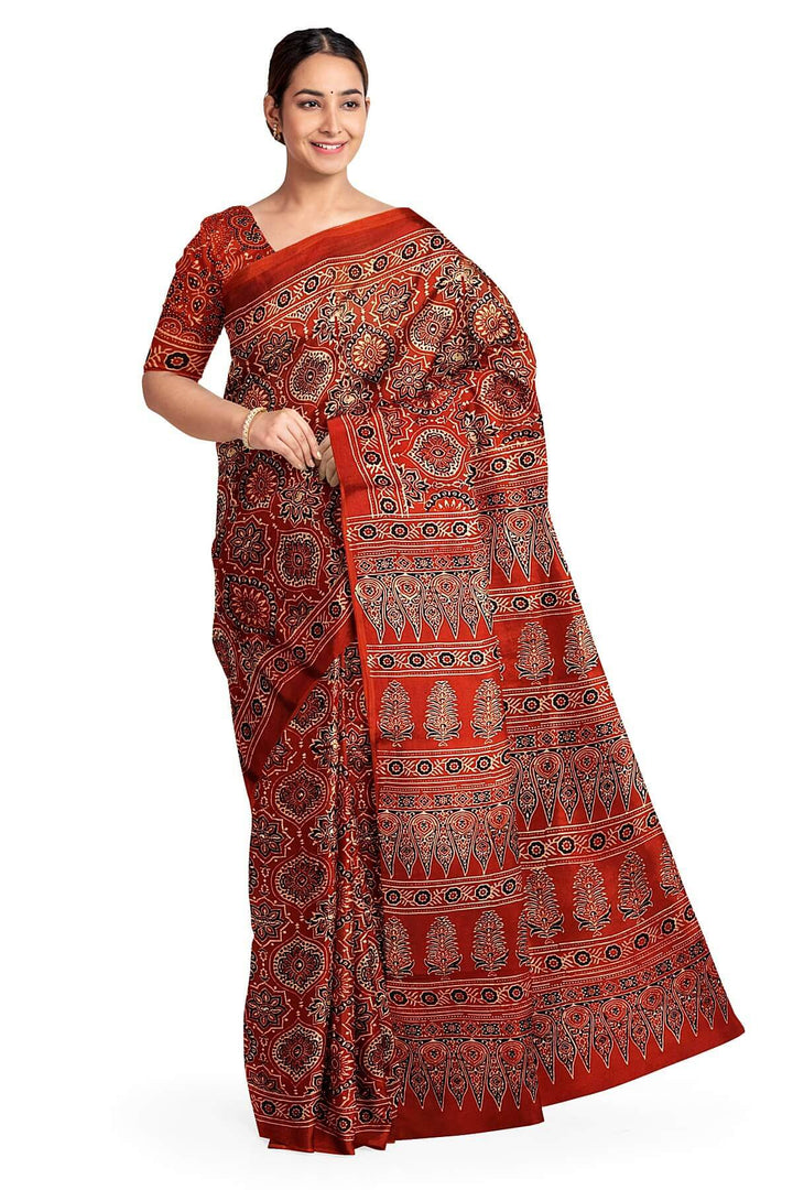 Modal silk saree in red in hand block ajrakh print in floral pattern
