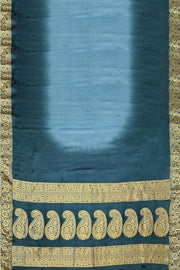 Modal silk saree in  shaded bottle green with zari pallu & borders.