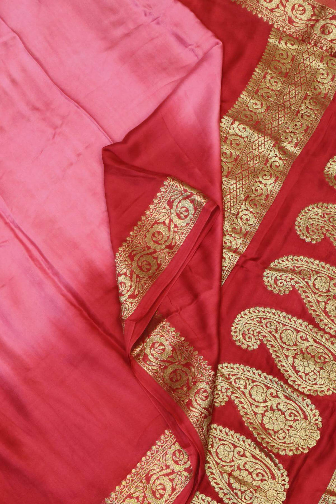 Modal silk saree in  shaded  pink with zari pallu & borders.