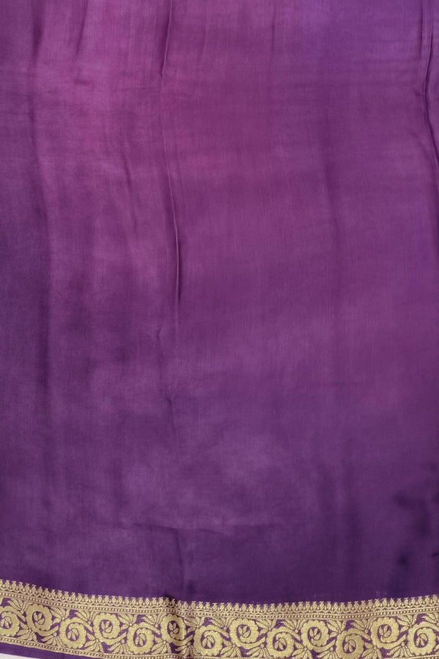 Modal silk saree in  shaded purple with zari pallu & borders.