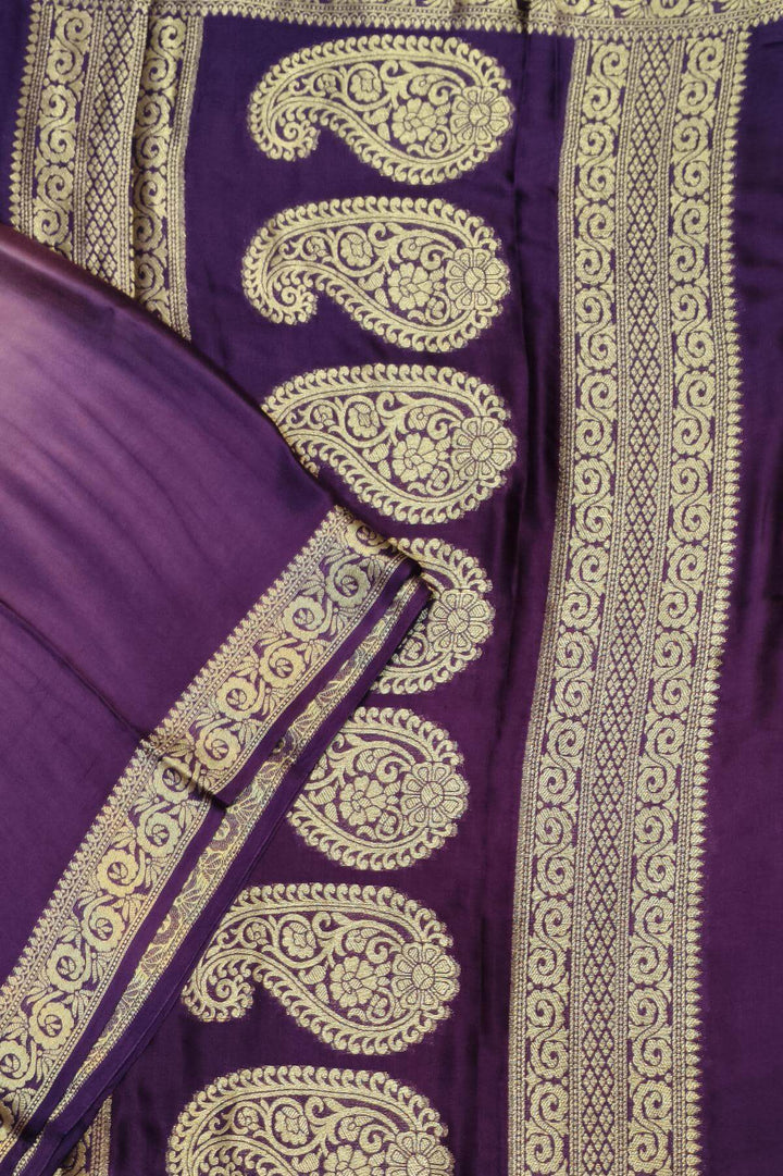 Modal silk saree in  shaded purple with zari pallu & borders.