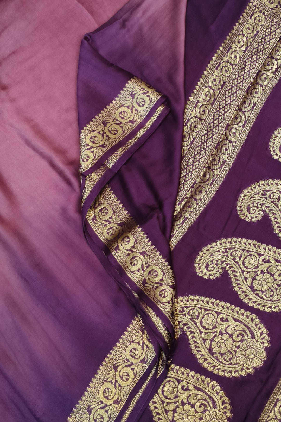 Modal silk saree in  shaded purple with zari pallu & borders.