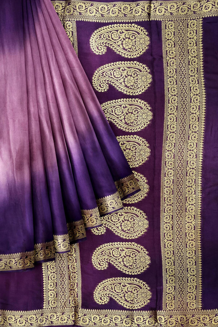 Modal silk saree in  shaded purple with zari pallu & borders.
