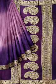 Modal silk saree in  shaded purple with zari pallu & borders.