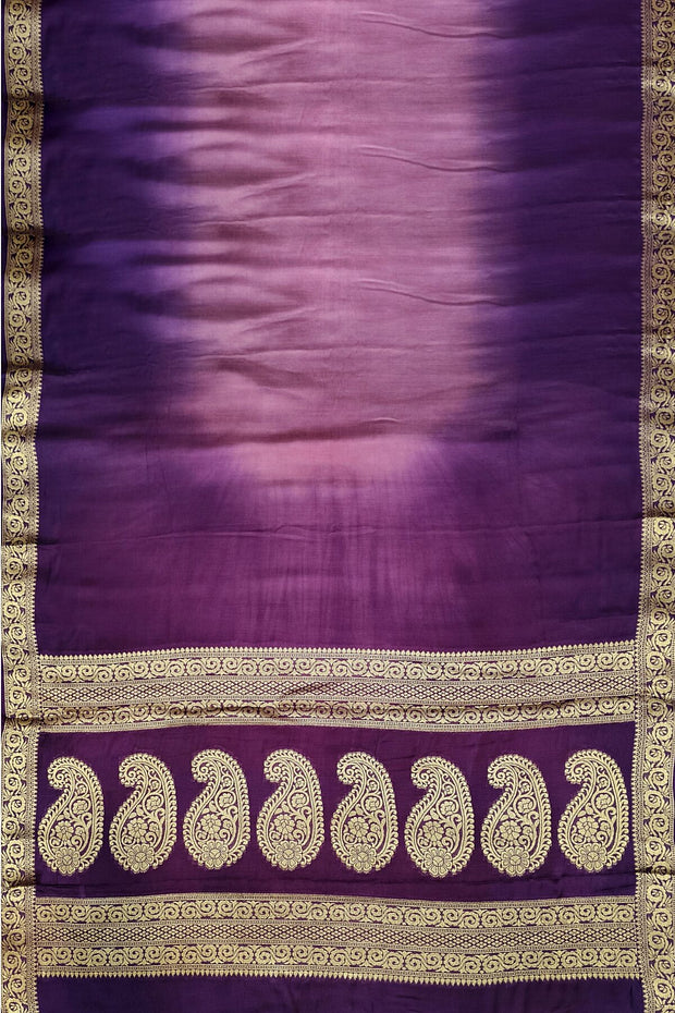 Modal silk saree in  shaded purple with zari pallu & borders.