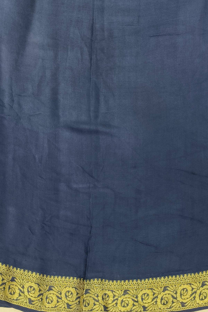 Modal silk saree in  shaded peacock blue with zari pallu & borders.