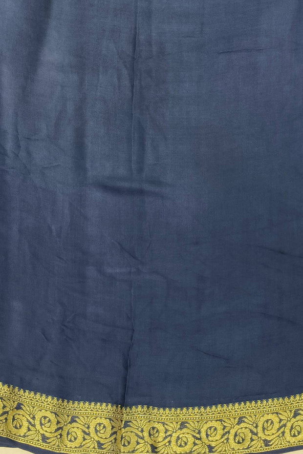 Modal silk saree in  shaded peacock blue with zari pallu & borders.