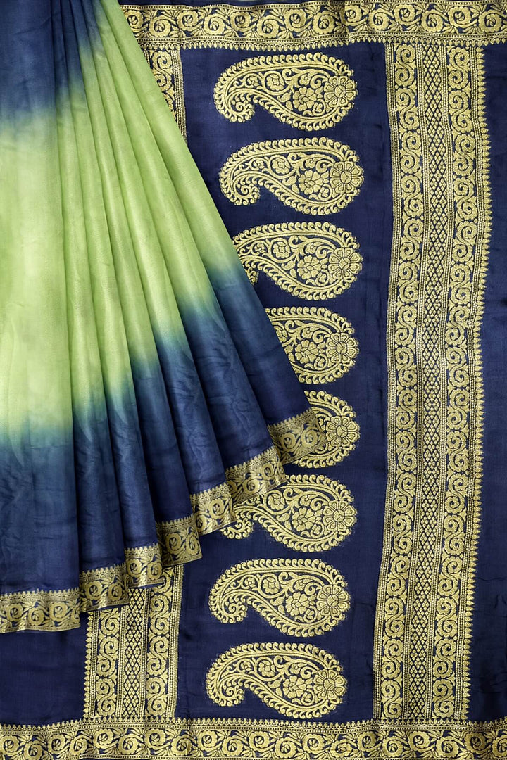Modal silk saree in  shaded peacock blue with zari pallu & borders.