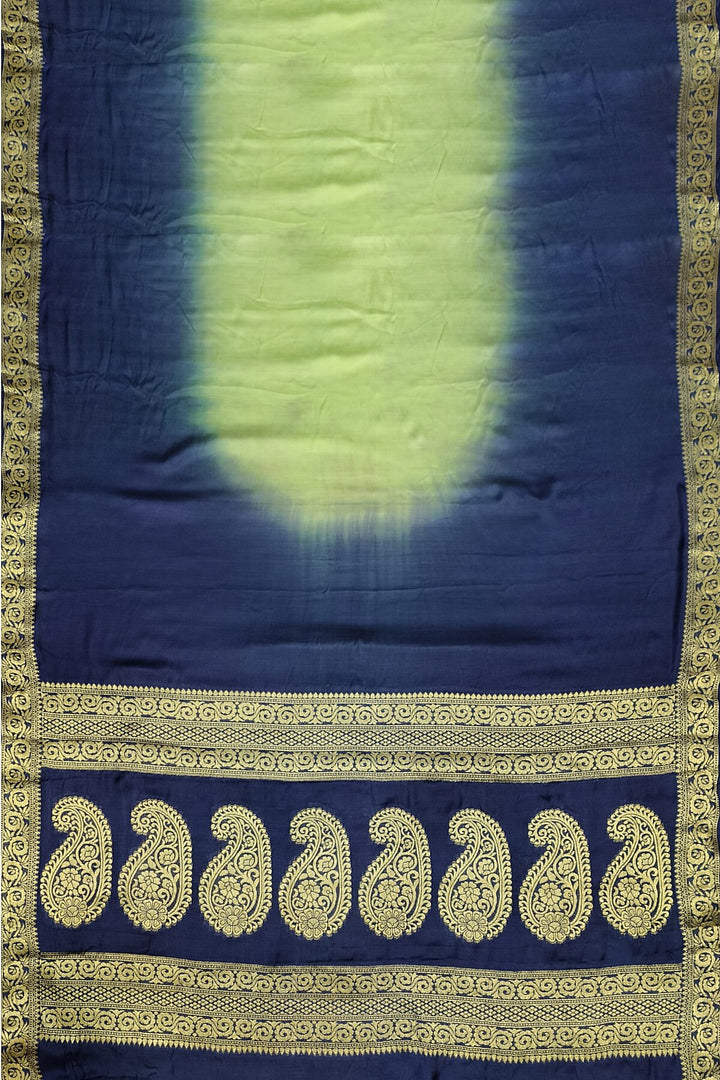 Modal silk saree in  shaded peacock blue with zari pallu & borders.