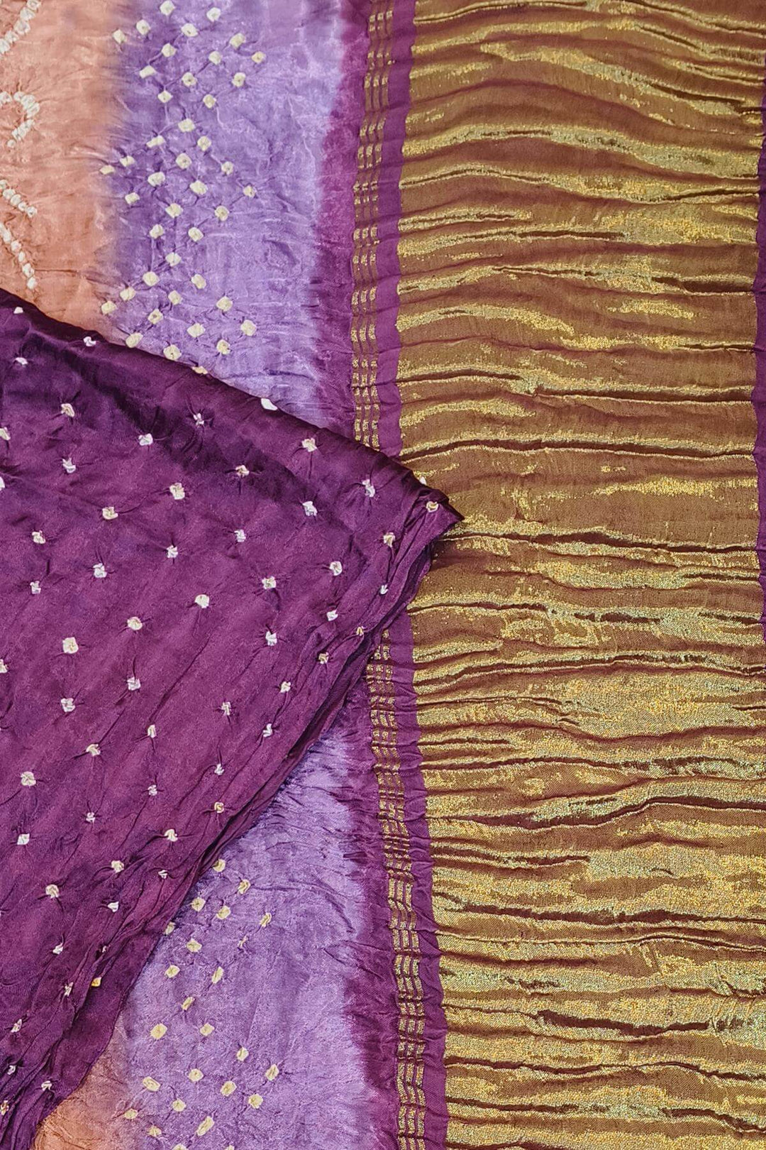 Modal silk bandhni saree  in purple with multicolour & tissue pallu