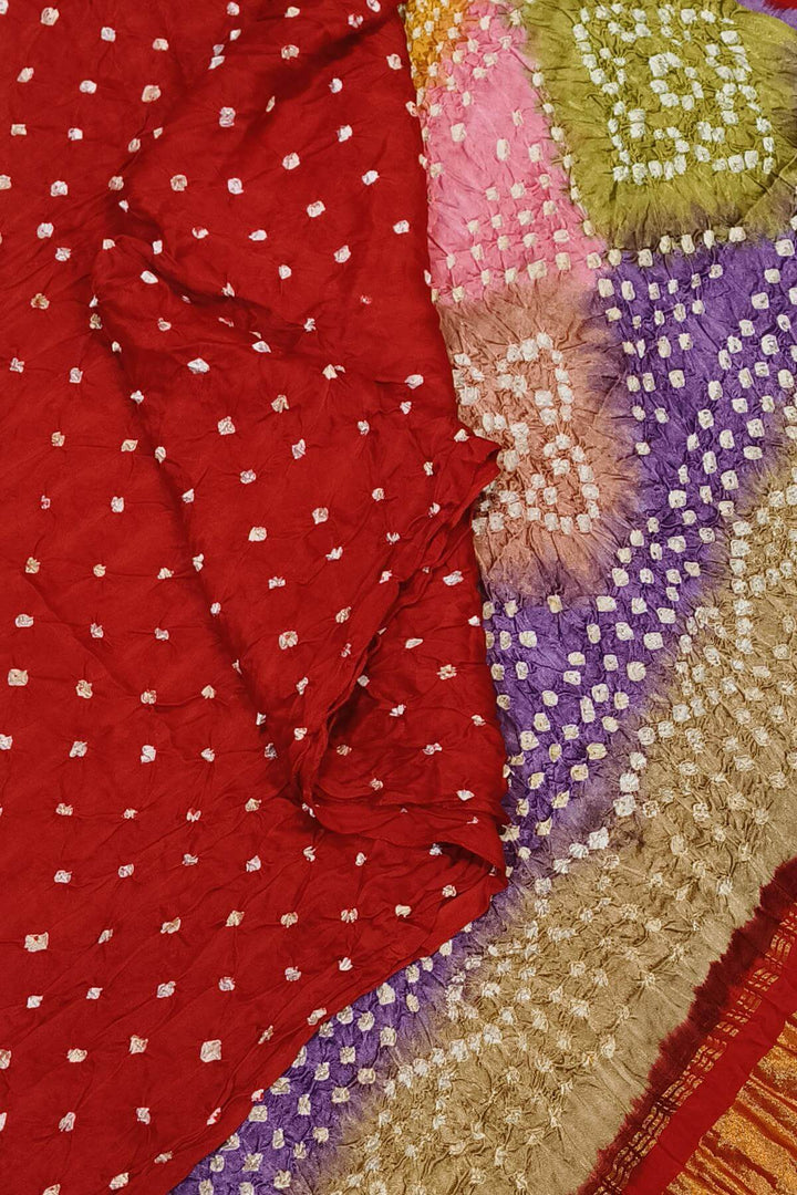 Modal silk bandhni saree  in red with multicolour & tissue pallu