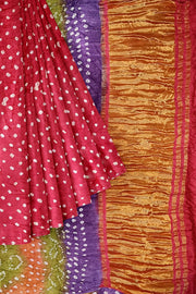 Modal silk bandhni saree  in pink with multicolour & tissue pallu