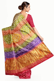 Modal silk bandhni saree  in pink with multicolour & tissue pallu