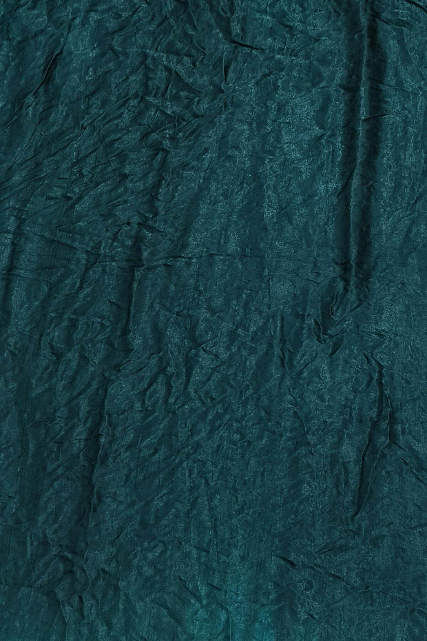 Modal silk bandhni saree  in bottle green with  tissue pallu