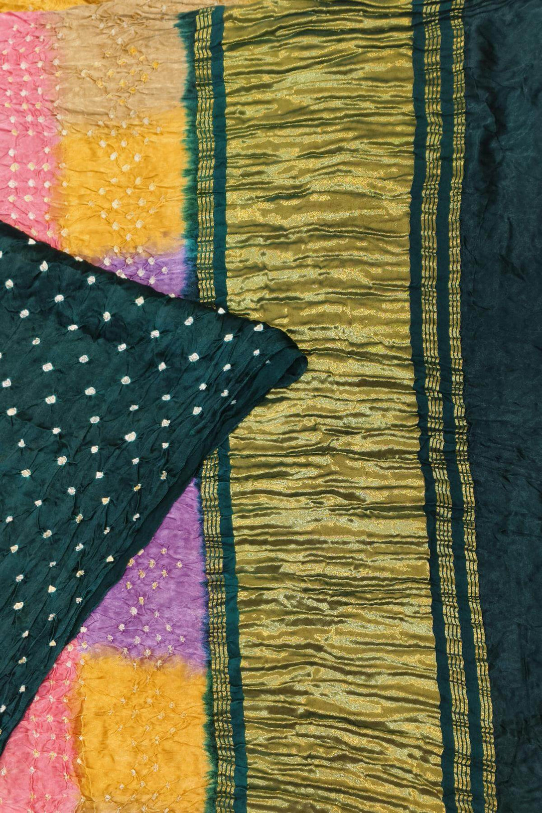 Modal silk bandhni saree  in bottle green with  tissue pallu