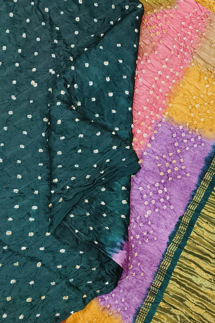 Modal silk bandhni saree  in bottle green with  tissue pallu