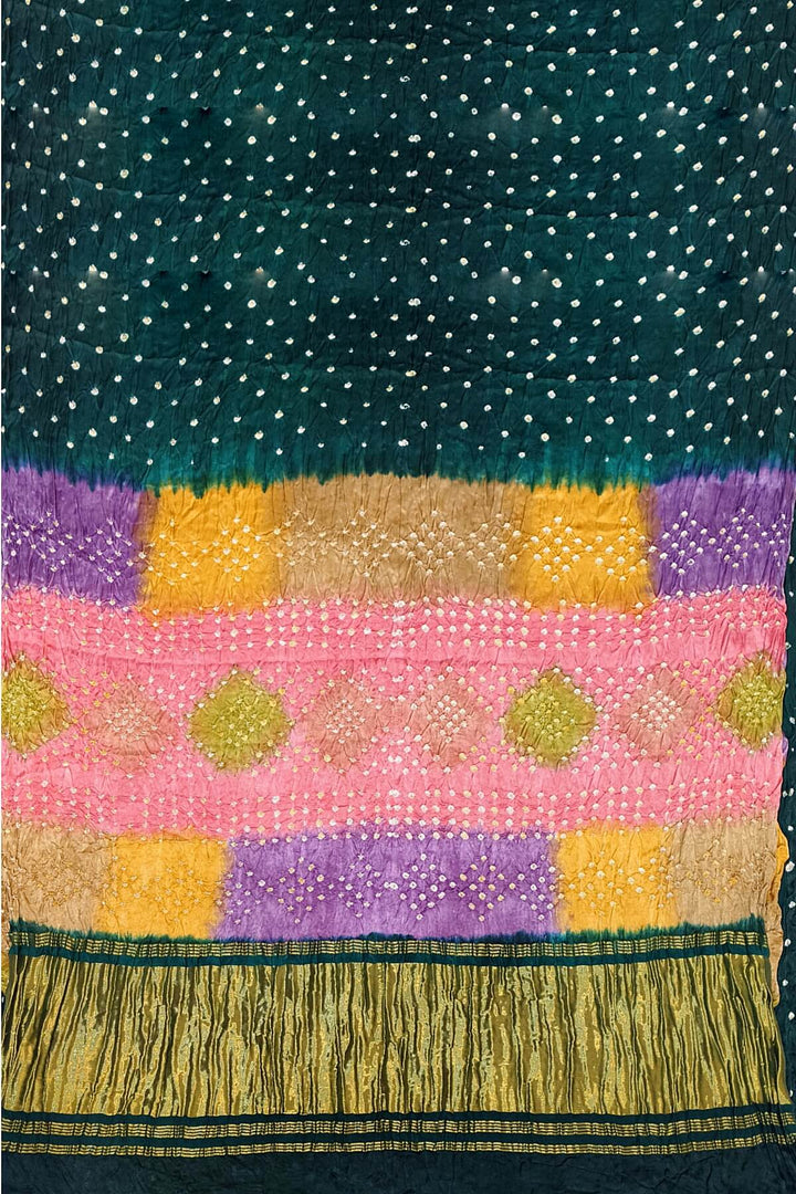 Modal silk bandhni saree  in bottle green with  tissue pallu