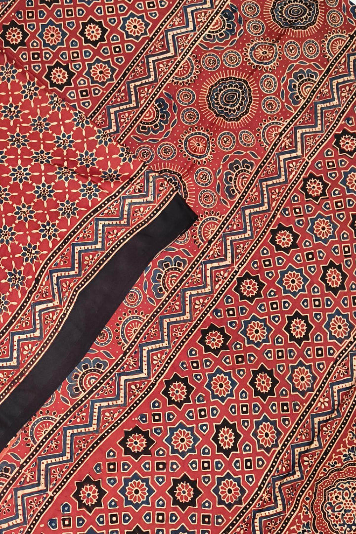 Modal silk saree in red in hand block ajrakh print