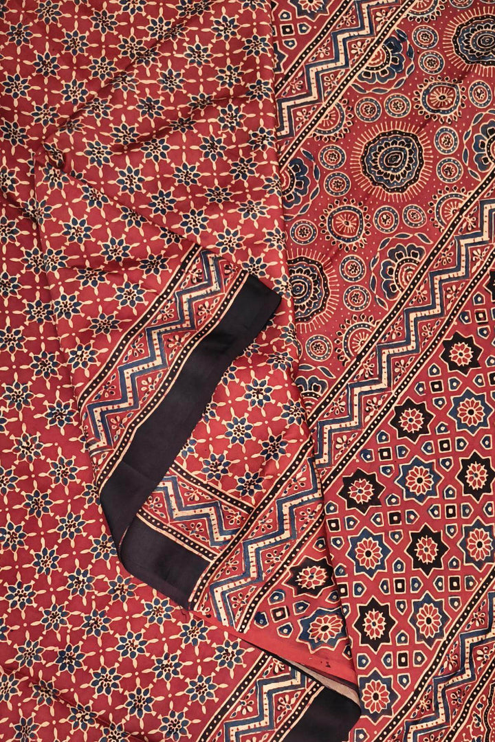 Modal silk saree in red in hand block ajrakh print