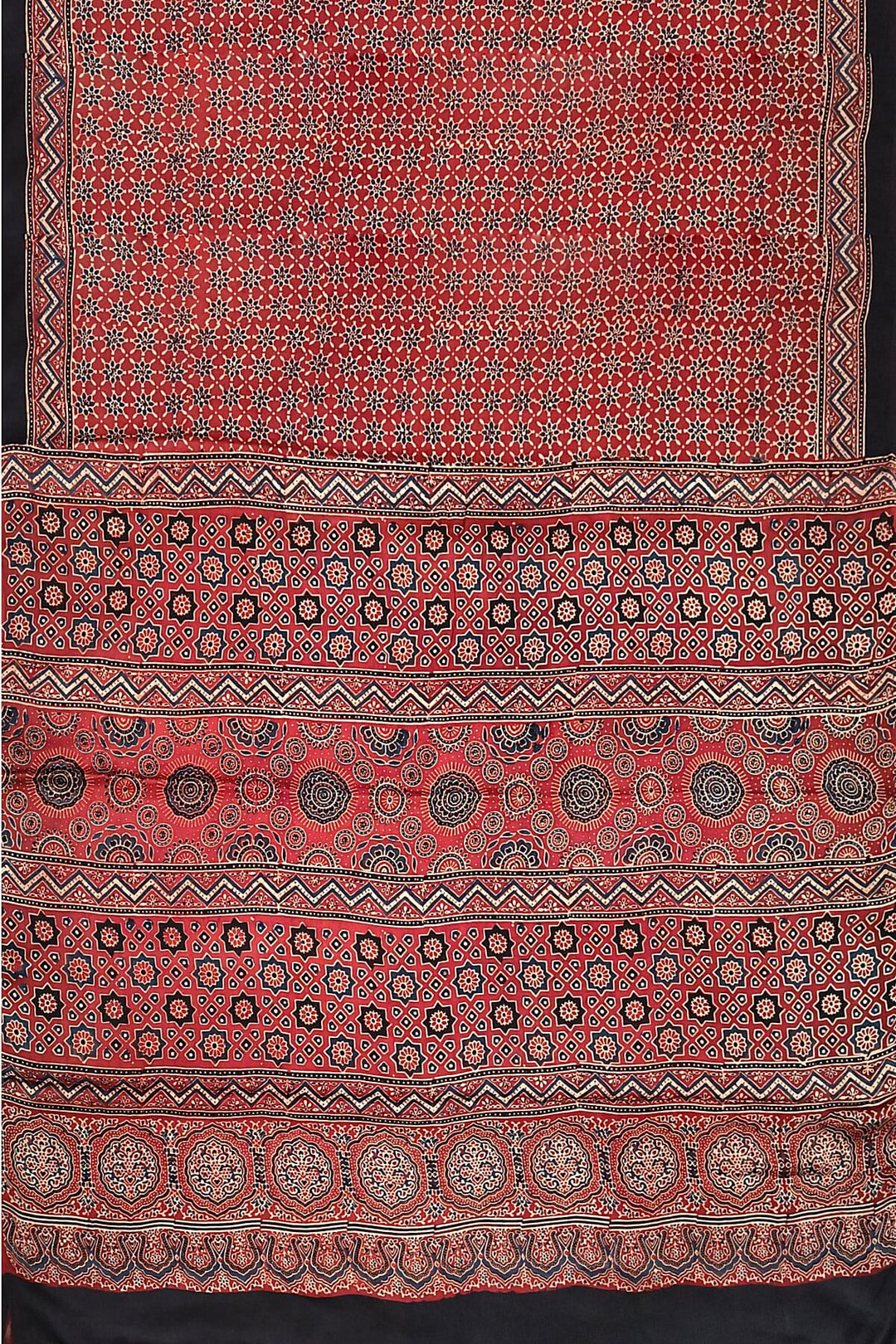 Modal silk saree in red in hand block ajrakh print