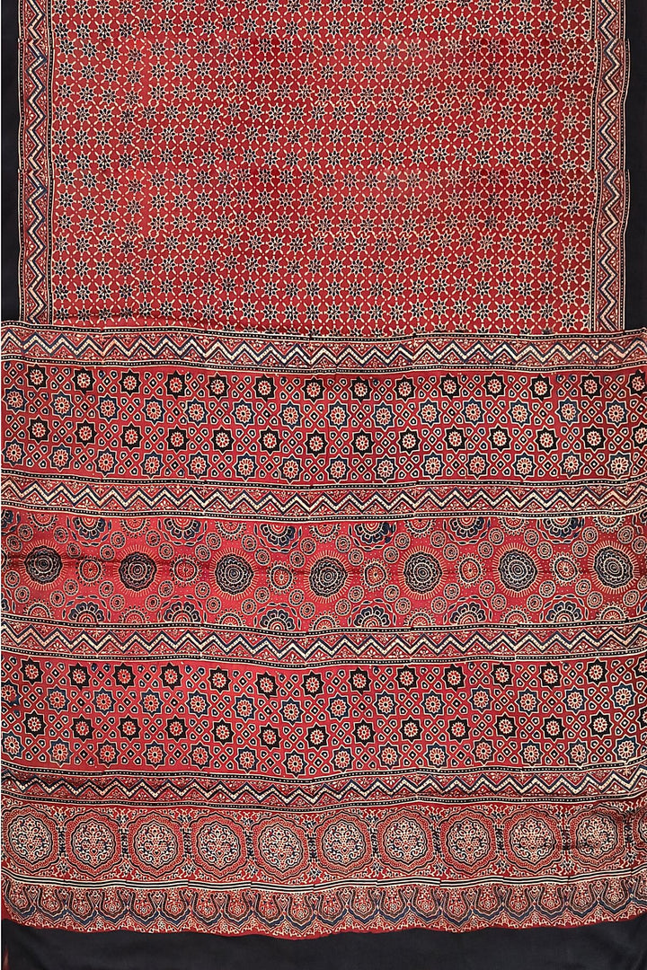 Modal silk saree in red in hand block ajrakh print