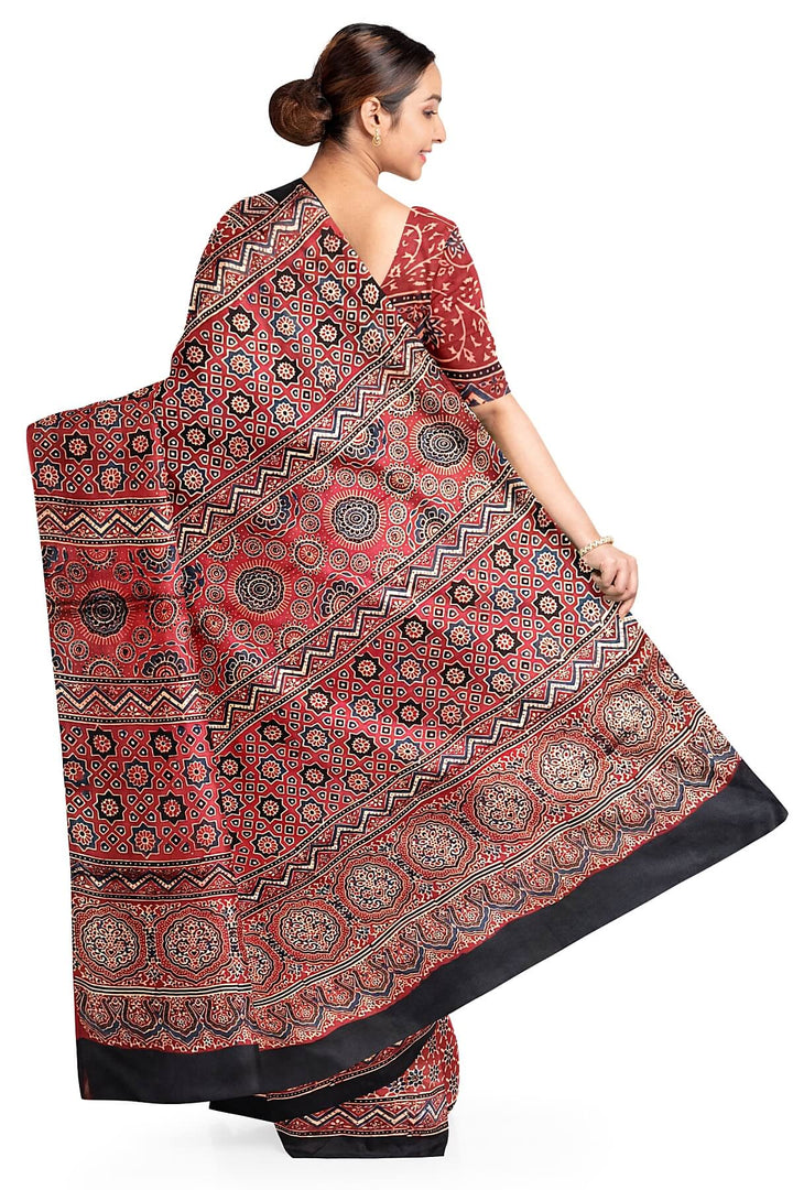 Modal silk saree in red in hand block ajrakh print