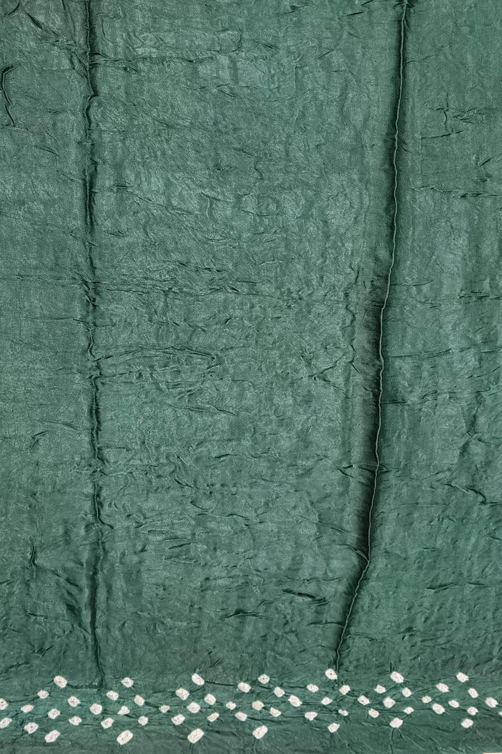 Modal silk bandhini saree  in bottle green