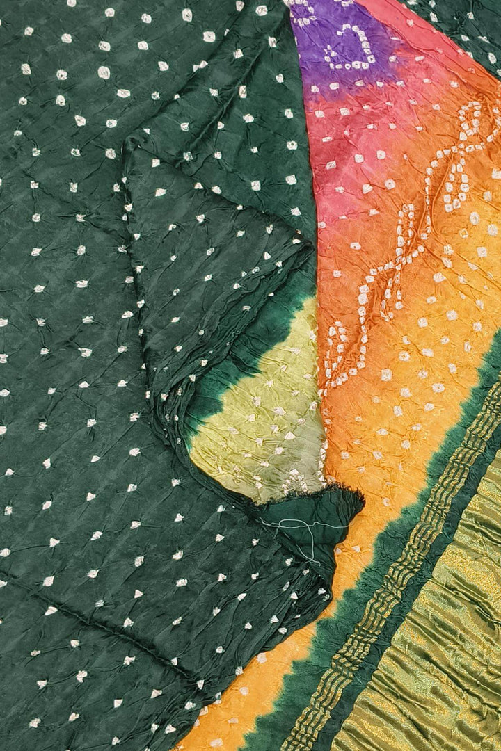 Modal silk bandhini saree  in bottle green