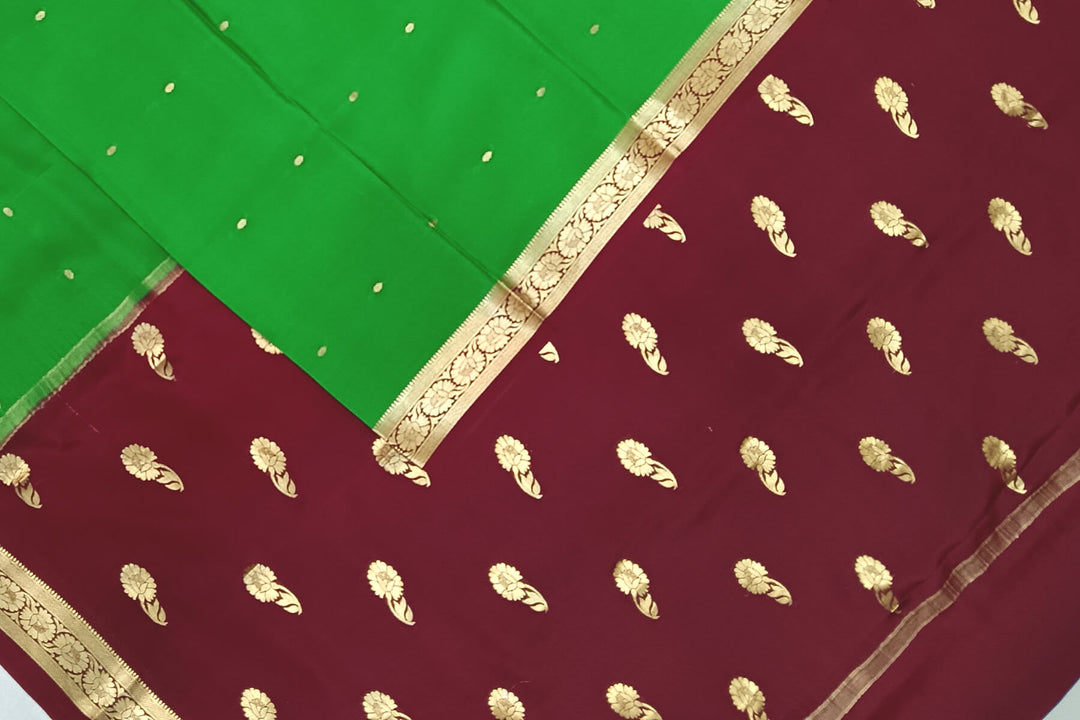 Mysore crepe pure silk saree in green with small motifs all over the body.