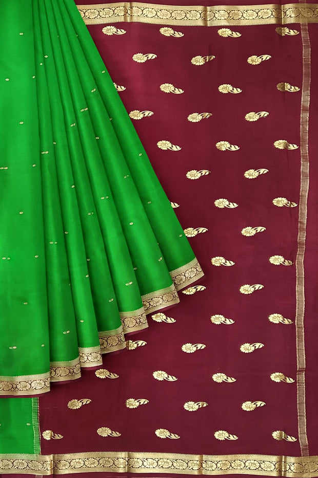 Mysore crepe pure silk saree in green with small motifs all over the body.