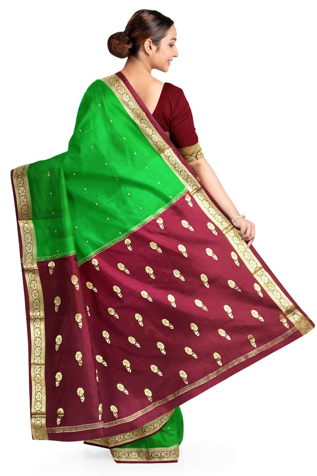 Mysore crepe pure silk saree in green with small motifs all over the body.