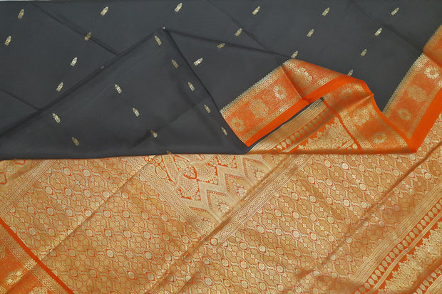 Mysore crepe silk saree in black  with small motifs