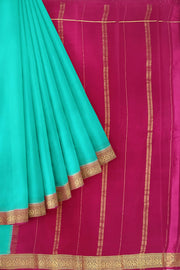 Gorgeous Mysore pure silk & pure gold zari saree in pool blue with striped pallu