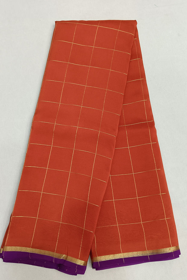 Gorgeous Mysore pure silk pure gold zari saree in in rust colour  with zari checks