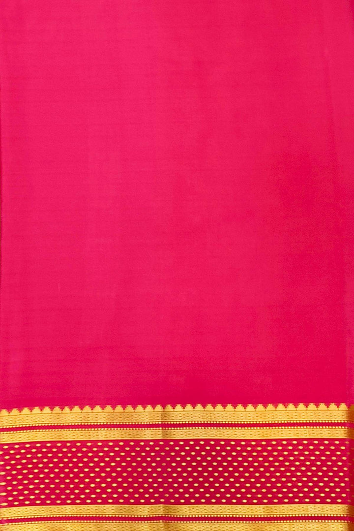 Mysore crepe pure silk saree in bottle green with bentex border.