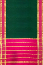 Mysore crepe pure silk saree in bottle green with bentex border.