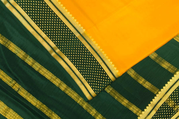 Mysore crepe pure silk saree in  mustard  with bentex border.