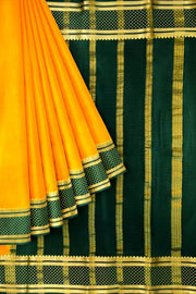Mysore crepe pure silk saree in  mustard  with bentex border.