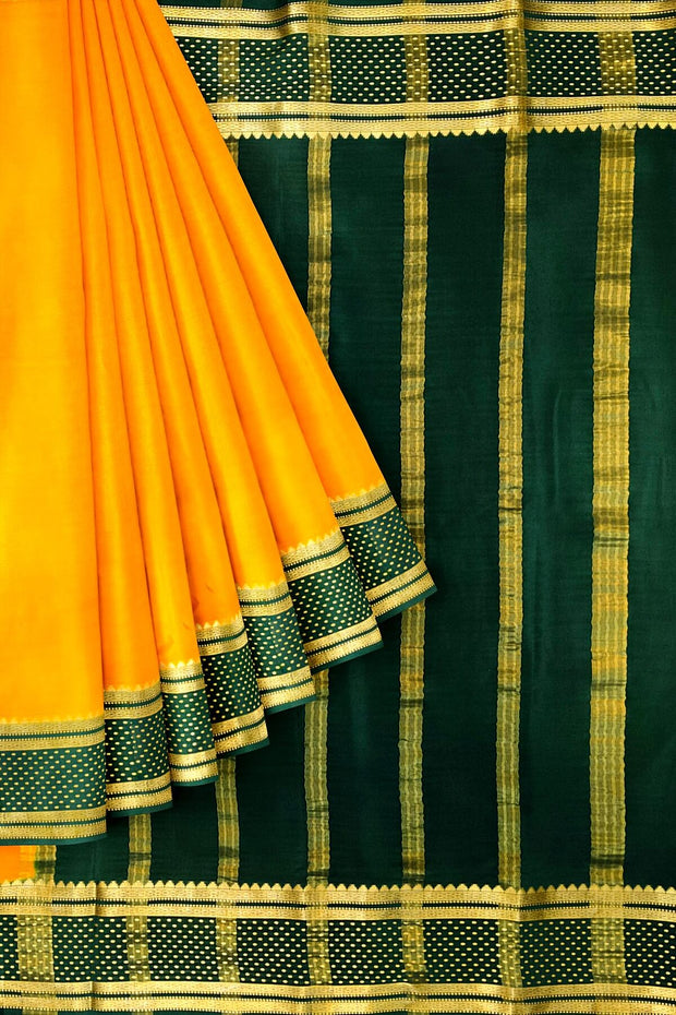 Mysore crepe pure silk saree in  mustard  with bentex border.