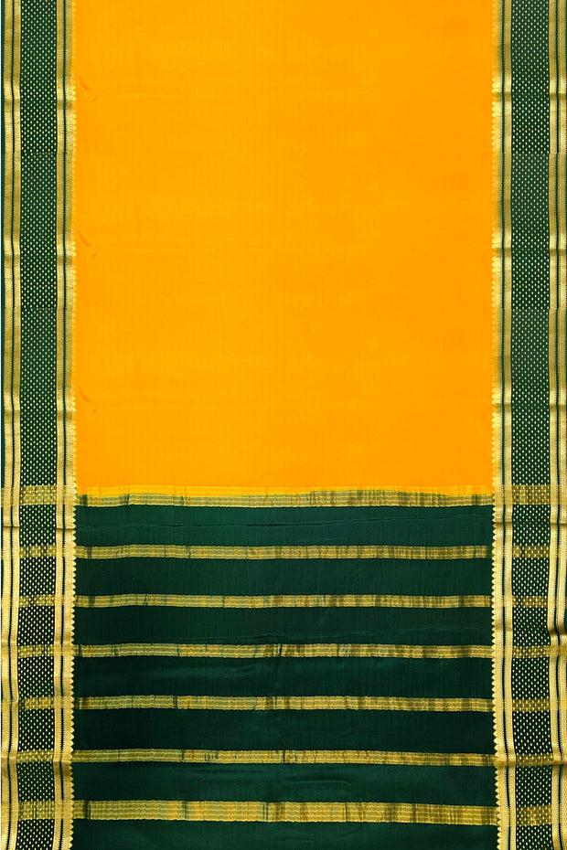 Mysore crepe pure silk saree in  mustard  with bentex border.