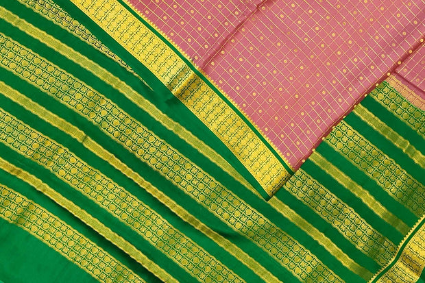 Mysore crepe pure silk saree in onion pink   with small checks & buttis all over the body.