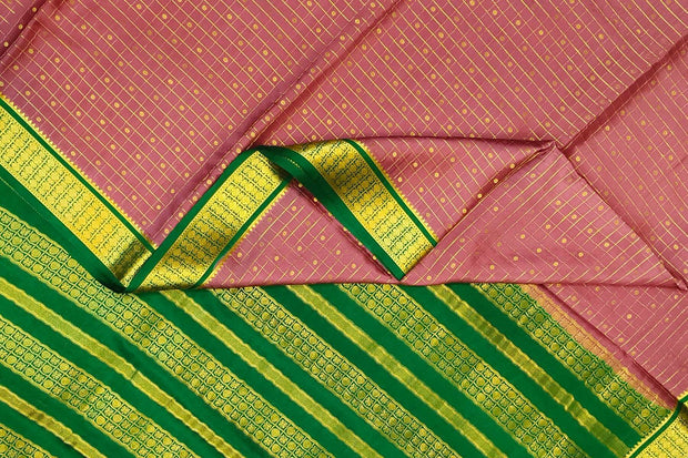 Mysore crepe pure silk saree in onion pink   with small checks & buttis all over the body.