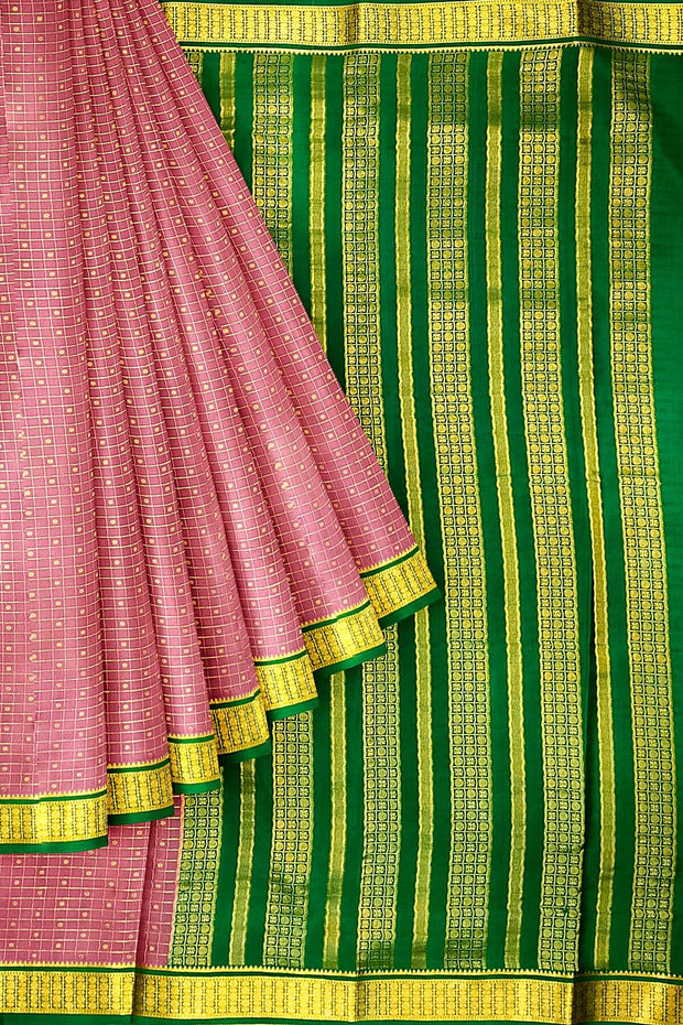 Mysore crepe pure silk saree in onion pink   with small checks & buttis all over the body.